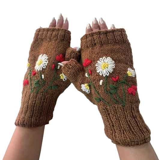 Brown knitted gloves with floral embroidery on a white background