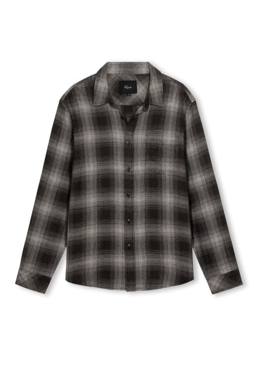 A long-sleeve button-up plaid shirt in black and gray, shown flat against a white background.