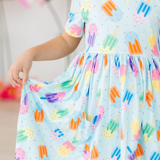 Mila & Rose Children's Clothing Mila & Rose Short Sleeve Pocket Twirl Dress - Multiple Colors 77083614 Mila & Rose Short Sleeve Pocket Twirl Dress - Multiple Colors