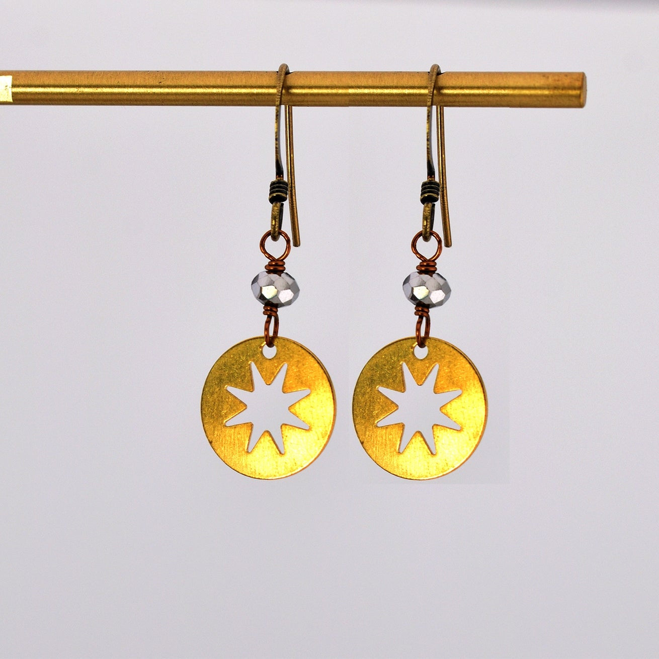 Edgy Petal Twinkle Star Earrings