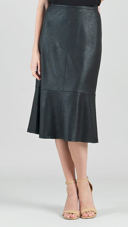 A woman wearing a black faux-leather midi skirt with a flared hem and beige high-heeled sandals, shown from the waist down against a light gray studio background.