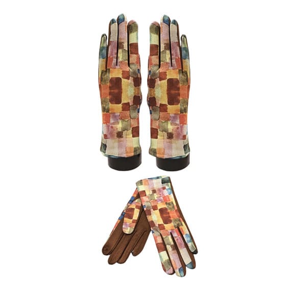 A pair of long gloves shown from two angles: one pair laid flat showing a multicolor patchwork pattern on the back and brown leather on the palms, and another pair standing upright showing the back pattern with dark cuffs. The background is solid white.