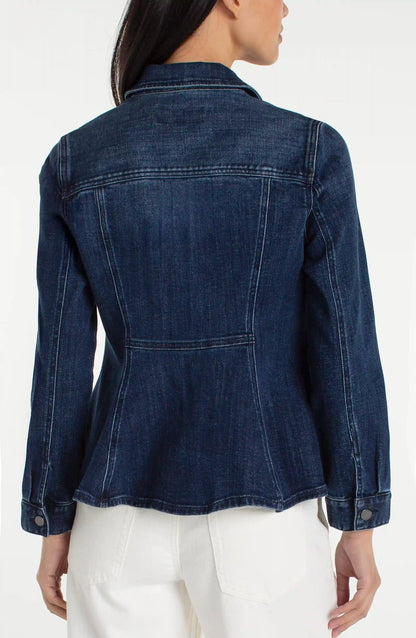Denim jacket worn by a person on a white background