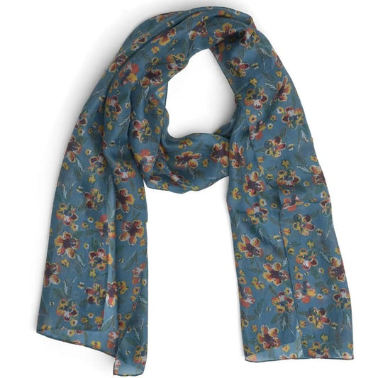 A lightweight blue silk scarf with a dense, multicolored floral print, draped in a loop against a plain white background.