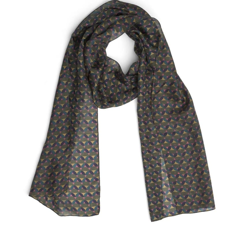 A lightweight silk scarf with a repeating geometric pattern in muted shades of blue, green, and gold on a dark gray base, displayed against a plain white background.
