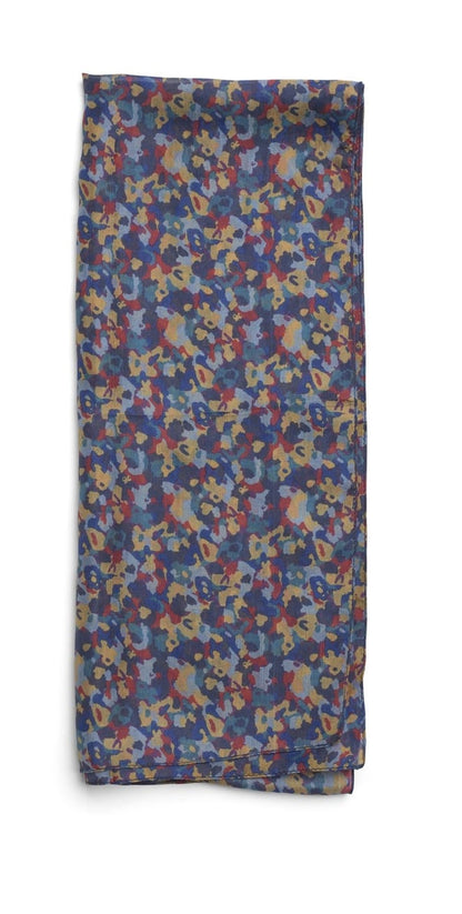 Multicolored patterned silk fabric scarf on a white background