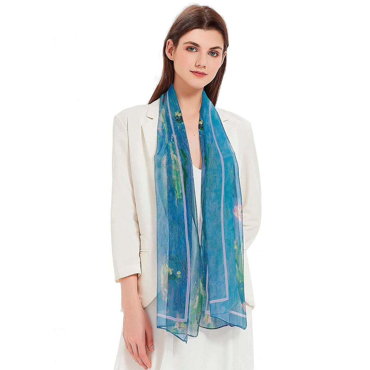 Woman wearing a blue scarf with a white background
