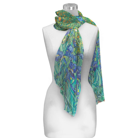 Mannequin wearing a floral patterned scarf on a white background