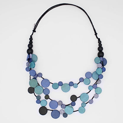 Necklace with blue and black beads on a white background