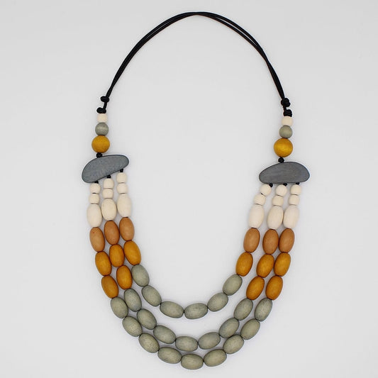 Necklace with multicolored beads on a white background