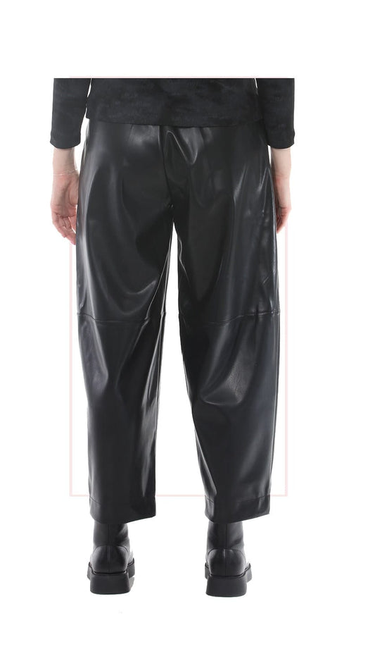 Black wide-leg faux leather pants with a glossy finish, shown on a model from the back against a white background.